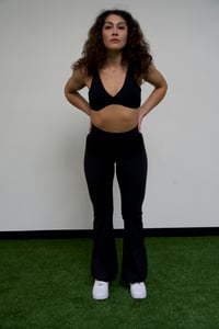 Image 1 of Black twist top and flare pants