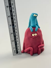 Image 9 of Red thing under a blue thing