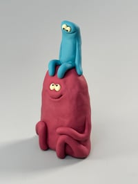 Image 4 of Red thing under a blue thing