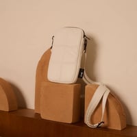 Image 3 of Luce • puffy phone pouch • white