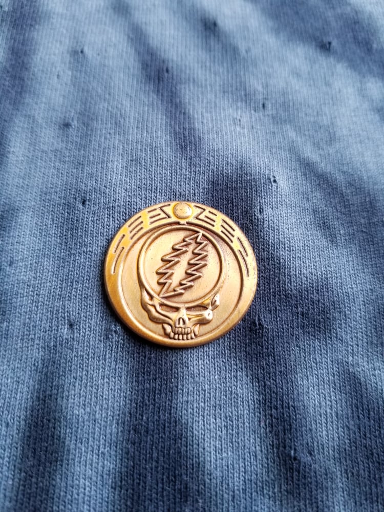 Image of Steal Your Face Pin. Comes with 10 GD stickers