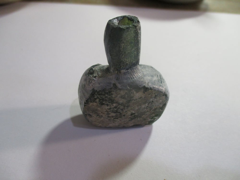 Very Special Offer: Not Advertised Small Roman Bottle FREE with any Purhase from Store Before Dec 15