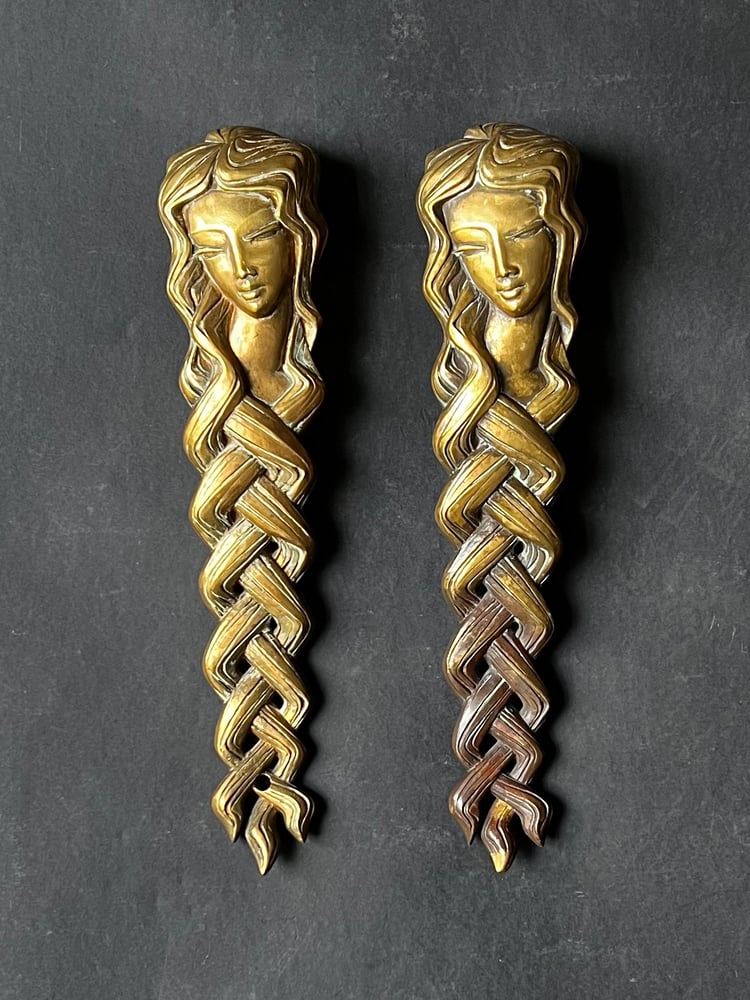 Image of Pair of Door Handles in the form of a Woman's Face with Braided Hair