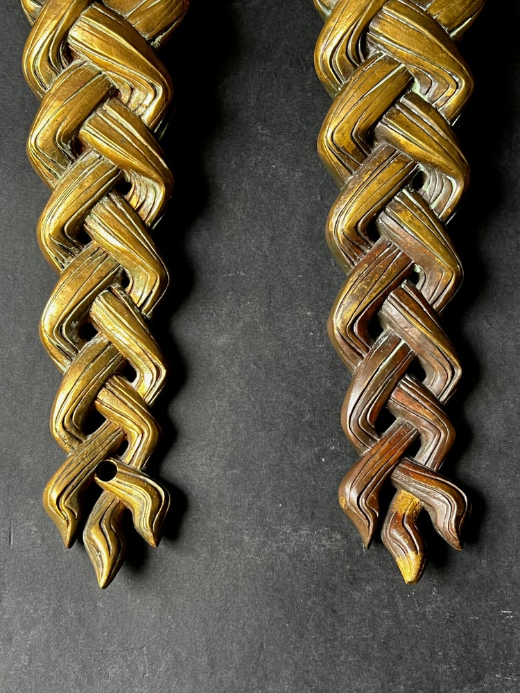 Image of Pair of Door Handles in the form of a Woman's Face with Braided Hair