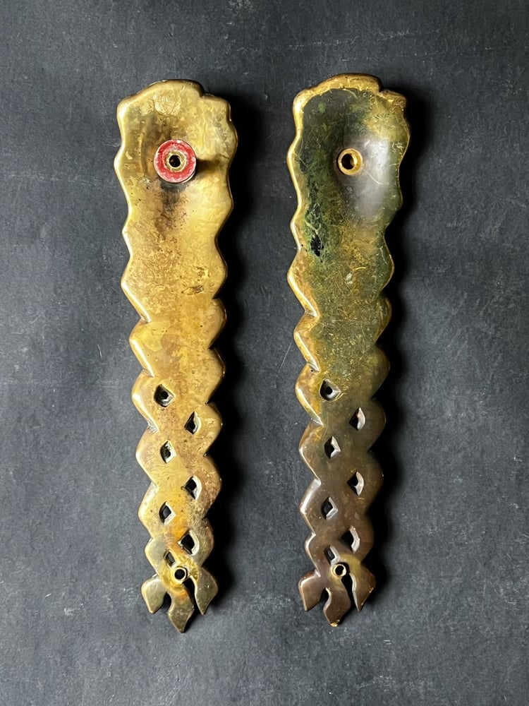 Image of Pair of Door Handles in the form of a Woman's Face with Braided Hair