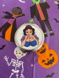 Show white compact mirror