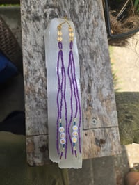 Image 1 of Long beaded purple YEM earrings