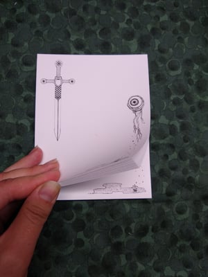 Image of Eyeball and Sword Notepad