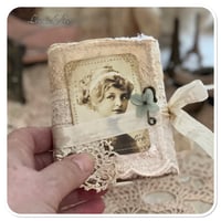 Image 1 of snippet book snippet roll in a vintage style button box