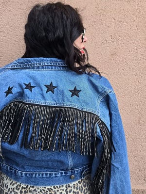 Chaqueta vaquera flecos