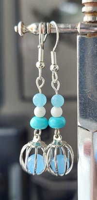 Agate cage earrings.