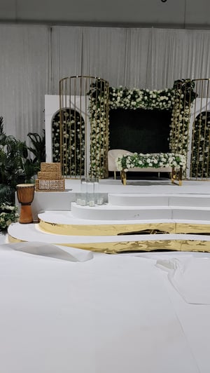 Image of Gold stainless steel backdrop frame curve lines 