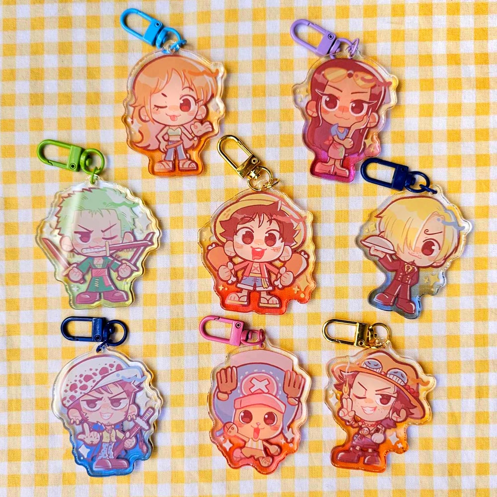 Image of pre/post time skip OP ✨ epoxy acrylic charm