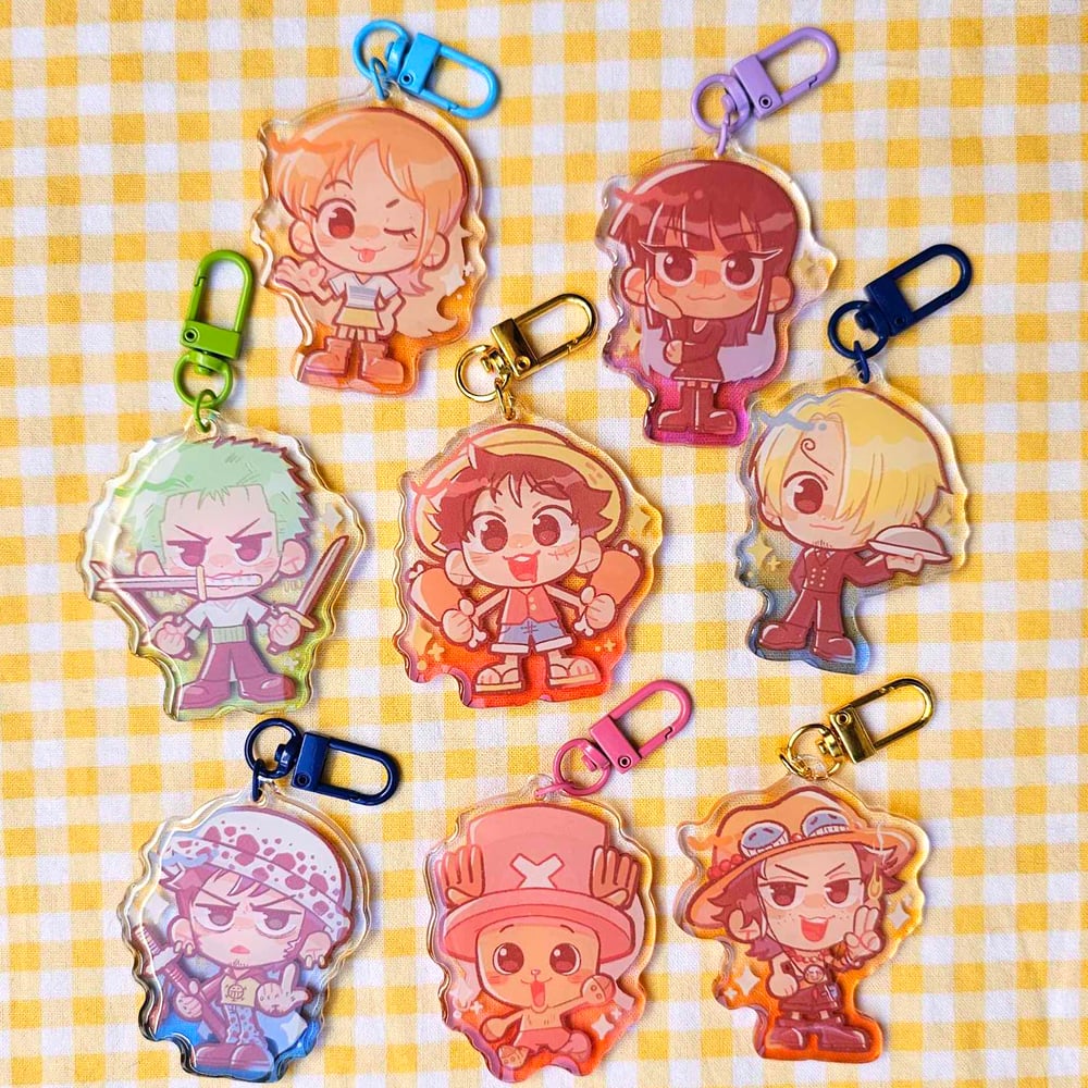 Image of pre/post time skip OP ✨ epoxy acrylic charm