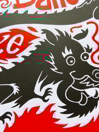 Image 2 of Un dragon dans le feu de l'action