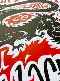 Image 3 of Un dragon dans le feu de l'action