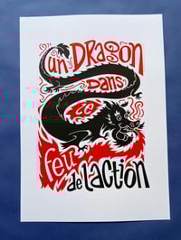 Image 4 of Un dragon dans le feu de l'action