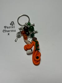 Image 1 of Pumpkin unicorn keyring 