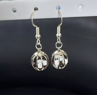 Black and white cage earrings.