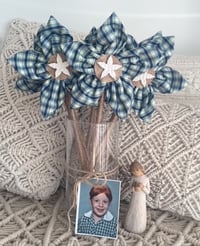 Image 1 of Memory Flowers custom created from a clients loved ones school uniform dress
