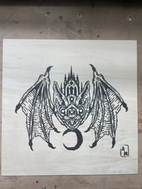 ‘The light for the dark’ on plywood 