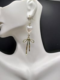 Image 3 of Dainty Gold Bow Pearl Heart Earrings