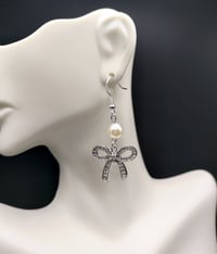 Image 2 of Dainty Pearl Silver Bow Earrings