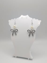 Image 5 of Dainty Pearl Silver Bow Earrings