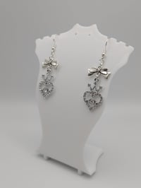 Image 5 of y2k Silver Rhinestone Heart Bow Earrings