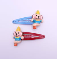 Image 2 of Silly Clown Puppy Monkey 2pc hair clip set