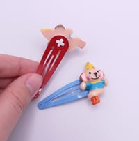 Image 4 of Silly Clown Puppy Monkey 2pc hair clip set