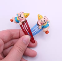 Image 5 of Silly Clown Puppy Monkey 2pc hair clip set