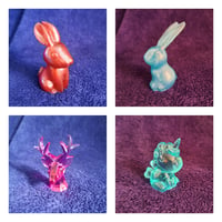 Resin animal models (bunnies, stag head, unicorn)