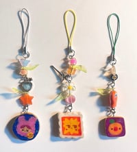 assorted phone charms 