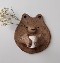 Image 1 of Bear and vase