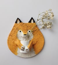 Fox and vase