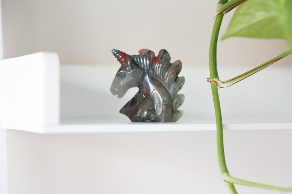 Image of Bloodstone unicorn head carving