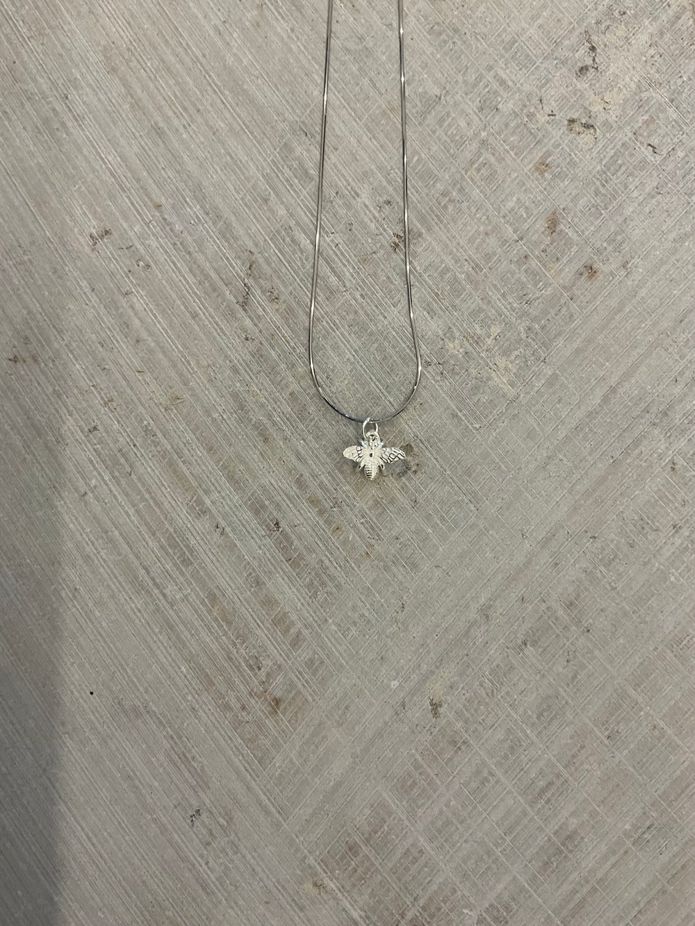 Silver fly necklace 