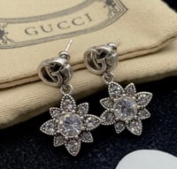 Image 3 of Double G Star Shaped Crystal Drop Earrings