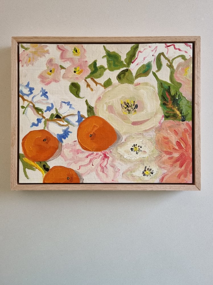 Image of Mandarins on floral cloth