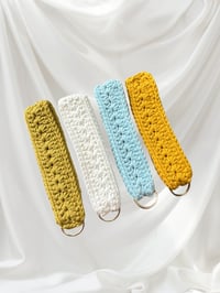 Image 1 of Daisy Chain Wristlet 