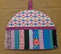 Image 1 of Striped tea cosies
