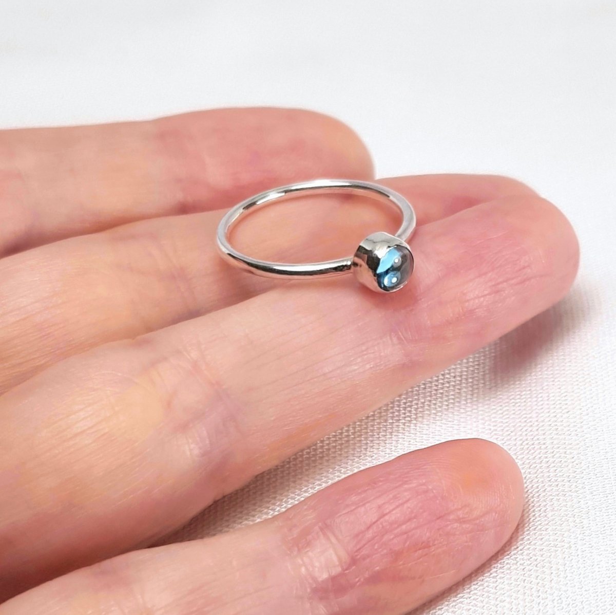 Image of Sterling Silver Blue Topaz Ring, Handmade Silver Stacking Ring, UK Hallmark
