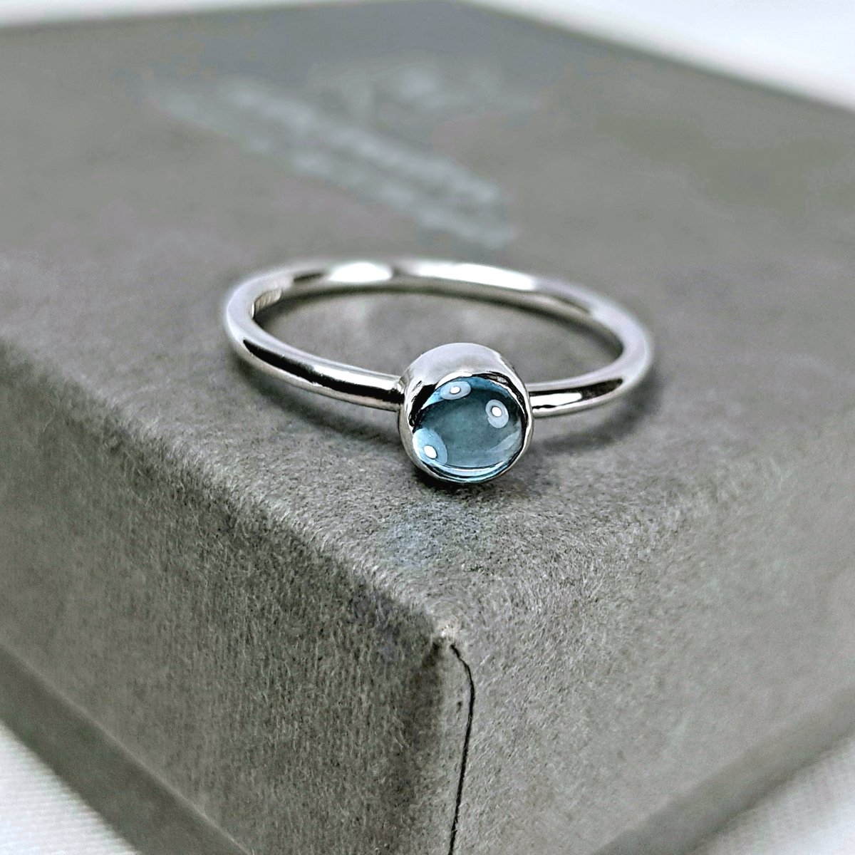 Image of Sterling Silver Blue Topaz Ring, Handmade Silver Stacking Ring, UK Hallmark