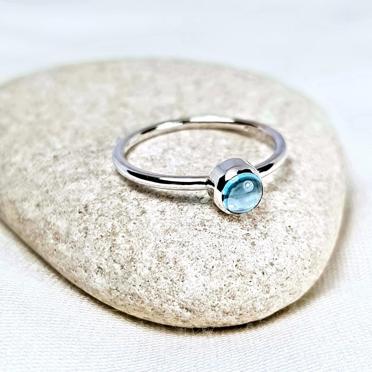 Image of Sterling Silver Blue Topaz Ring, Handmade Silver Stacking Ring, UK Hallmark