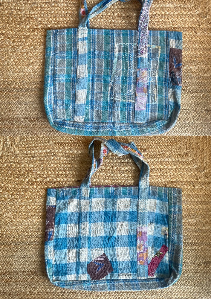 Each large shopper patchwork bag is handcrafted using layers of up-cycled vintage Indian cotton saris fabric. It’s been sewn together using a traditional straight running stitch embroidery technique.
They are roomy and lot's will fit and the interior includes a slip pocket.

The vibrant different patterns and intricate stitches tell a story of heritage and craftsmanship, making this bag not just an accessory but a piece of wearable art.
Because it is made with vintage fabric...