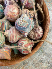 Image 1 of Hand Marbled wooden drop baubles // Mixed patterns and colours 