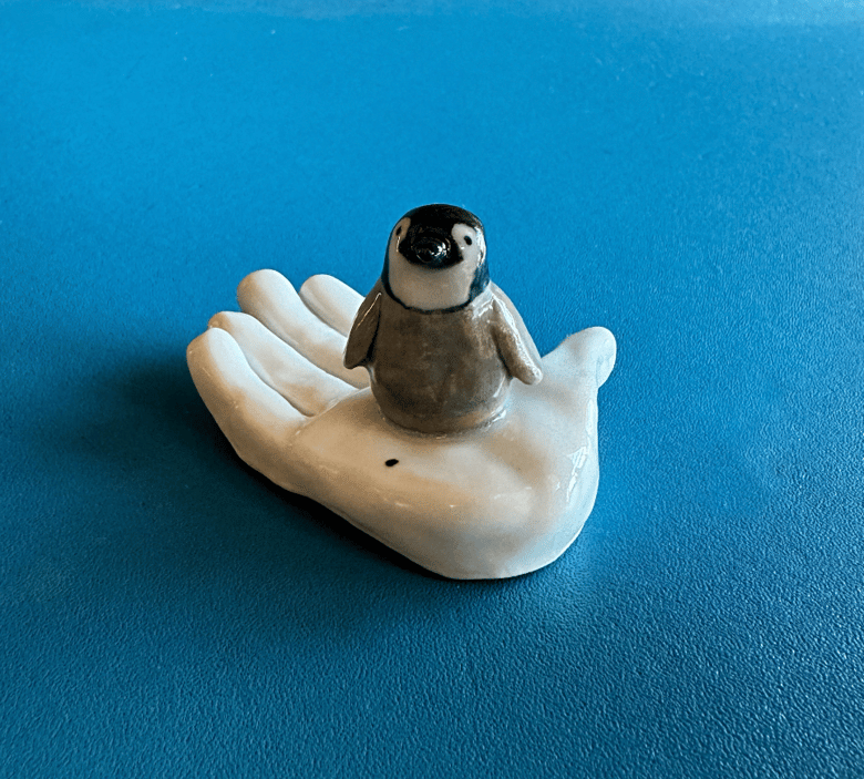 Image of Porcelain Lil Penguin on a Lil Iceberg Hand