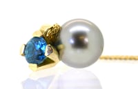 Image 4 of Blue zircon and tahitian pearl pendant in 18ct yellow gold