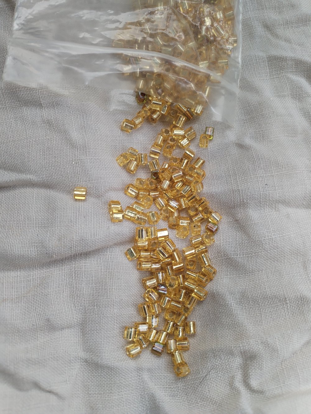 Image of gold cube beads